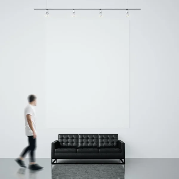 Man in gallery waching empty canvas — Stock Photo, Image