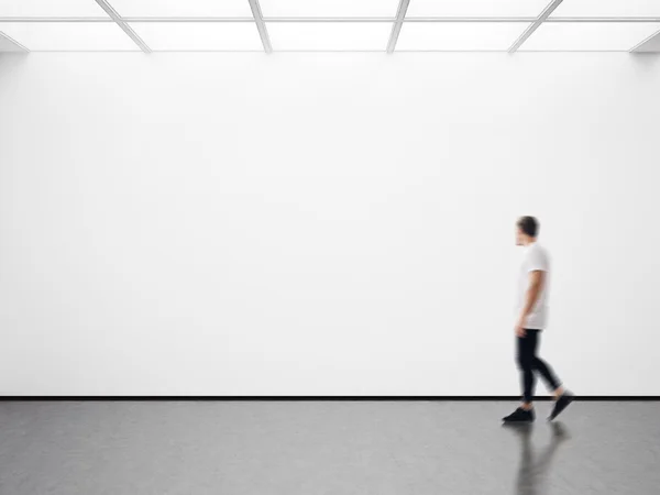 man in modern gallery