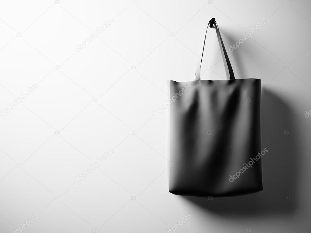 Photo black cotton textile bag hanging right side. Empty white wall background. Highly detailed texture, space for business message.  Horizontal. 3d render