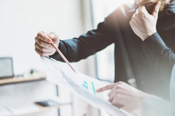 Team job process. Closeup photo young business managers  working with new startup project in modern office.Analyze document, plans. Holding papers, documents, pencil hands. Horizontal, blurred — Stock Photo, Image