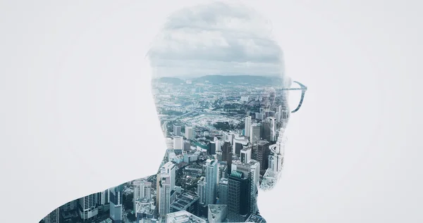 Photo of stylish bearded banker wearing trendy suit and looking city. Double exposure, panoramic view contemporary megalopolis background. Space for your business message.  Isolated white. Wide — Stock Photo, Image