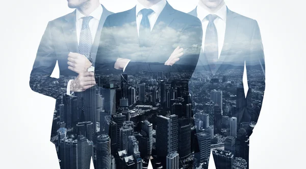 Photo of trio stylish adult businessman wearing trendy suit. Double exposure, panoramic view contemporary city background. Man power, leadership, isolated on white. Horizontal — Stock Photo, Image