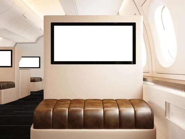 Photo interior of private airplane. Empty leather chair. Blank digital screen ready for your information. Luxury jet business travel. Horizontal mockup. 3d rendering — Stock Photo, Image