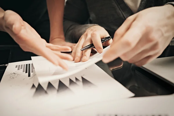 Business situation,signs reports. Photo female hand showing document. Man holding report and using pen. Working process modern office,discussion startup,finance analyze. Horizontal. Film effect — Stock Photo, Image