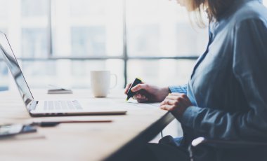 Working process modern office. Finance manager working wood table with new business startup.Using marker for documents. Horizontal. Film and flare effects. Blurred background