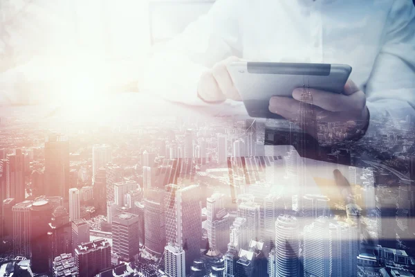 Double exposure photo.Man touching modern tablet.Investment trader manager working new private banking project office.Using electronic device.City skyscrapers background,film and bokeh effect. — Stock Photo, Image