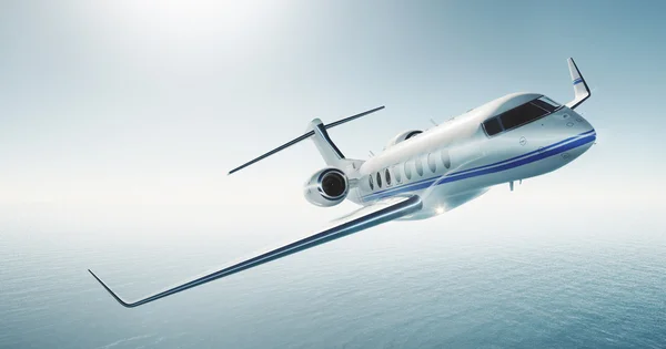 Photo of white luxury generic design private jet flying over the sea. Empty blue sky at background. Business travel concept. Horizontal . 3d rendering — Stock Photo, Image