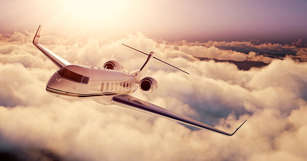 Realistic picture of White Luxury generic design private airplane flying over the earth at sunset. Empty blue sky with huge white clouds  background. Business Travel Concept. Horizontal. 3d rendering