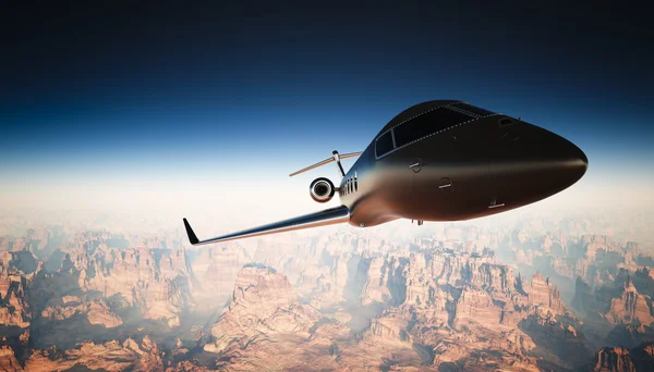 Foto Cabina Nero opaco Design generico Private Jet Volare in cielo sotto la superficie terrestre. Sfondo del Grand Canyon. Foto di viaggio d'affari. Vista orizzontale, ad angolo retto. Effetto pellicola. Rendering 3D . — Foto Stock