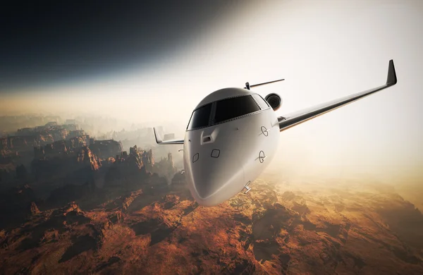 Zdjęcie biały błyszczący luksusowy ogólny Design Private Jet Flying in Sky pod ziemią Surface. Grand Canyon tło wschód słońca. Podróż służbowa obraz. poziomo, efekt przedni View. film. Renderowanie 3D. — Zdjęcie stockowe