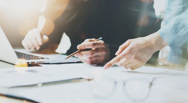 Photo Coworkers Team Working Modern Office.Man Using Generic Design Laptop Holding Pencil. Account Manager Work New Startup project. Process at Wood Table. Horizontal. Burred Background. Film effect — Stock Photo, Image