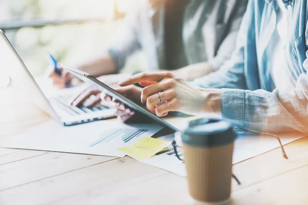 Work Process in Modern Studio.  Account Manager Working at Wood Table with New Business Project.Touching Screen Digital Tablet.Man Wearing using Laptop.Horizontal. Film efect. Blurred background. — Stock Photo, Image