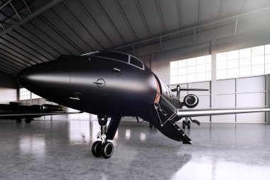 Closeup photo of Black Matte Luxury Generic Design Private Jet parking in hangar airport. Concrete floor. Business Travel Picture. Horizontal, front angle view. Film Effect. 3D rendering.