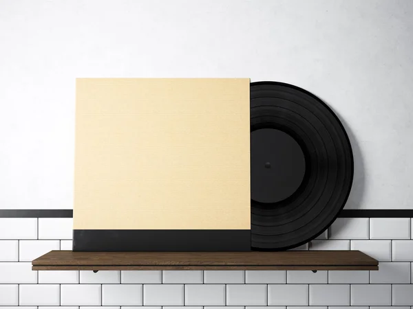 Plantilla de álbum de música de vinilo de imagen en la estantería de madera natural.Fondo de pared de ladrillos pintados blancos.Estilo vintage, materiales de fila de alta textura.Cubierta de disco en blanco de papel artesanal. Horizontal. Renderizado 3D . — Foto de Stock