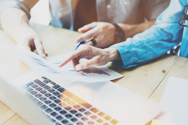 Sales Managers Working Modern Studio.Woman Showing Hand Market Report Charts.Marketing Department Planning New Strategy.Researching Process Wood Table.Horizontal.Blurred Background.Film effect. — Stock Photo, Image