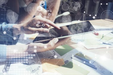 Woman Touching Screen Electronic Tablet Hand.Project Manager Researching Process.Business Team Working New Startup modern Office.International Strategy Icon Chart Interfaces.Analyze market stock.Blur