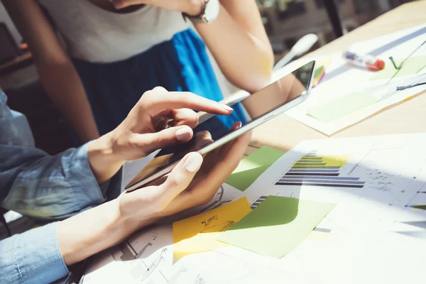 Hipster Girl Touching Hand Digital Tablet Display.Reflections Screen.Account Producer Researching Process.Young Business Crew Working New Startup Studio.Analyze market stock.Blurred,film effect.Horiz — Stock Photo, Image