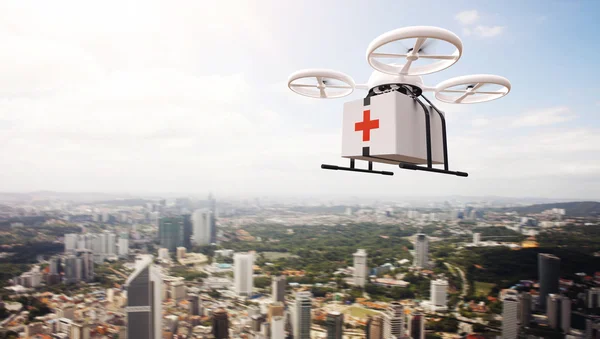 Photo White Generic Design Remote Control Air Drone Flying Sky Medical Box Under Urban Surface.Modern City Background.Ambulance Fast Delivery.Horizontal,Right Side Angle View.Film Effect.3D rendering. — Stock Photo, Image