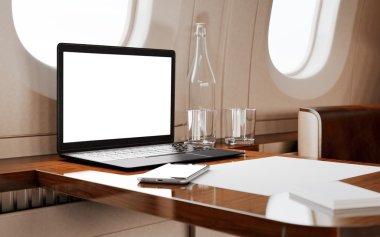 Modern Laptop in Private Airplane clipart
