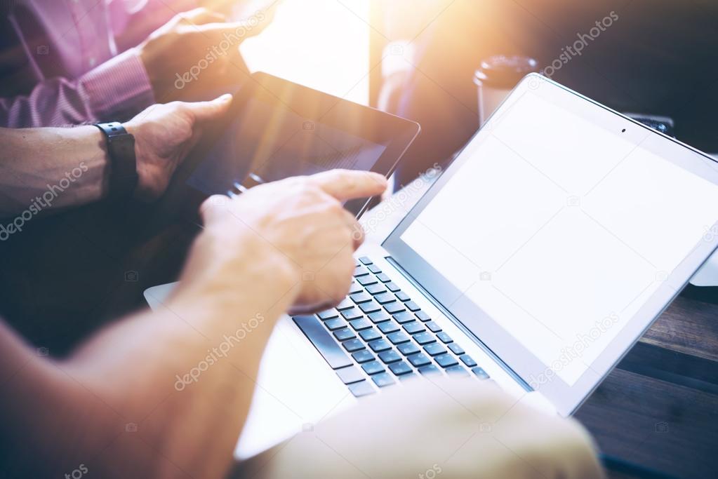 Closeup Business Team Brainstorming Process.Coworkers Startup IT Technology.Businessman Using Modern Electronic Device.Creative People Work New Digital Project Urban Office.Notebook Tablet Hand Mockup