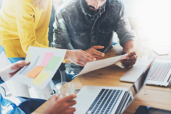 Coworkers Team Brainstorming During Work Process Modern Loft. Business Startup.Teamwork Concept.Woman Discussing Finance Report Colleagues.Young People Working Laptop Gadget Wood Table Desk.Blurred. — Stock Photo, Image