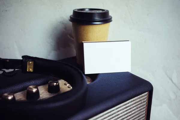 Closeup Stack Blank Business Card Portable Speaker.White Paper Mockup Take Away Coffee Cup Empty Wall Background.Modern Lifestyle Objects Mock Up. — Stock Photo, Image