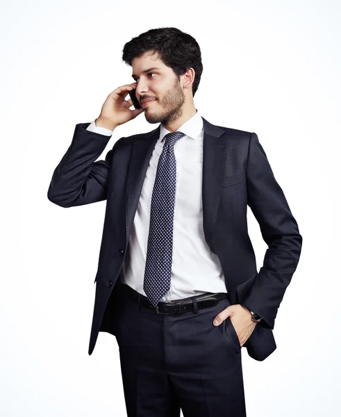 Молодий бізнесмен по телефону — стокове фото