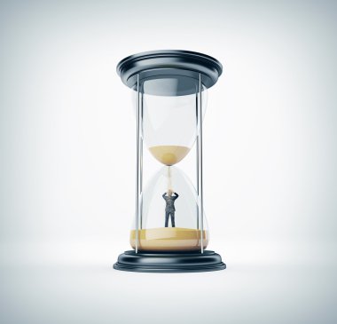 kum saati ile işadamı içinde