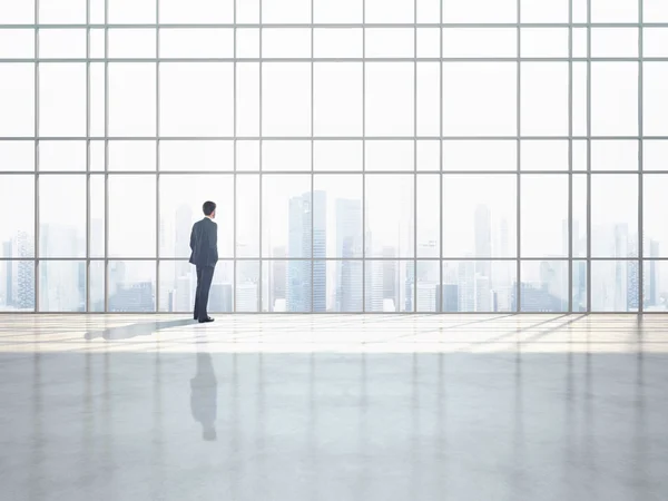 Businessman in  office interior — Stock Photo, Image