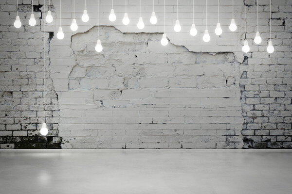 Damaged brick wall with bulbs