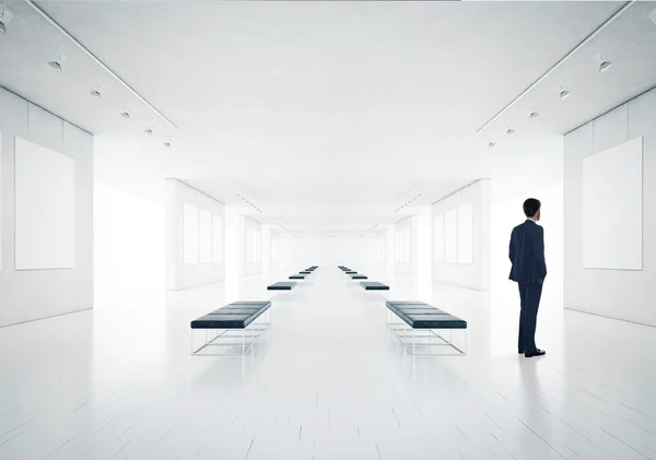 Man in gallery — Stock Photo, Image