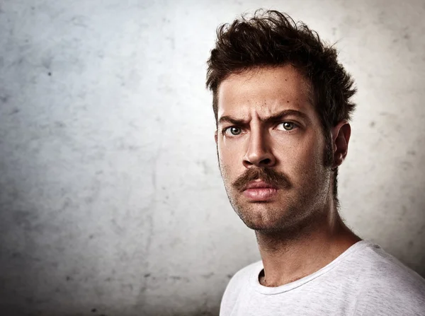 Brutal man with a mustache — Stock Photo, Image