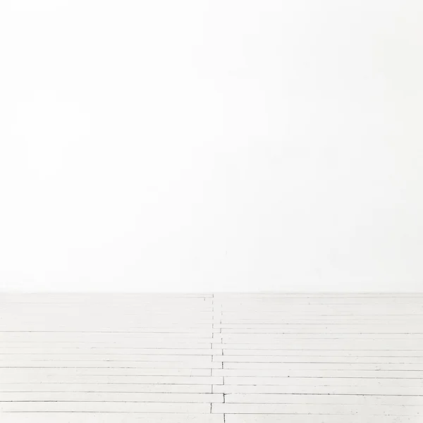 Witte muur en houten vloer — Stockfoto