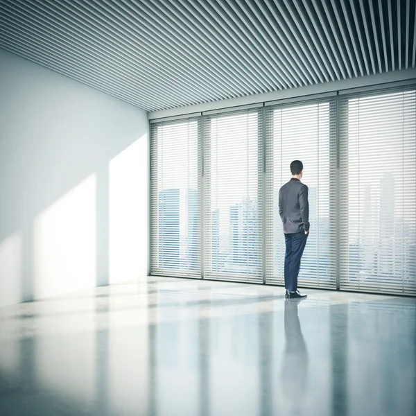 Businessman standing in office — Stock Photo, Image