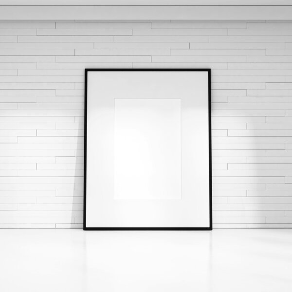 White decorative wall with white picture frame