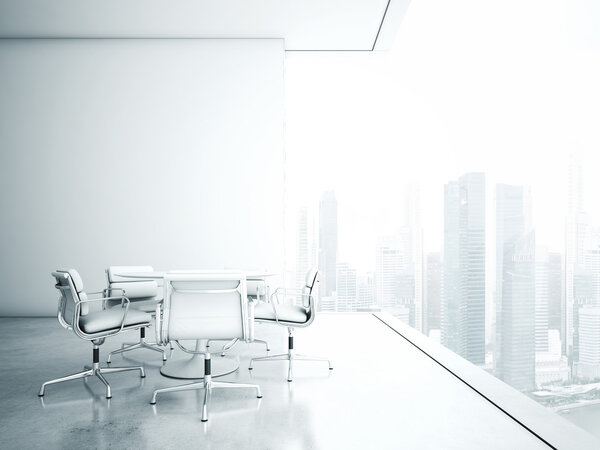 White meeting room with panoramic city view