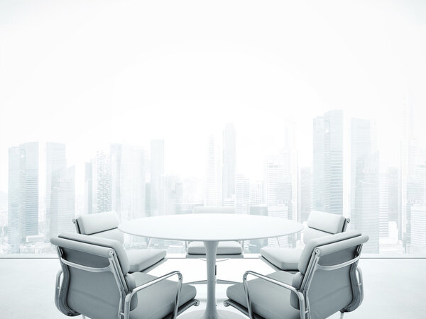 White meeting room with panoramic city view