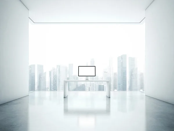 Table with screen in office — Stock Photo, Image