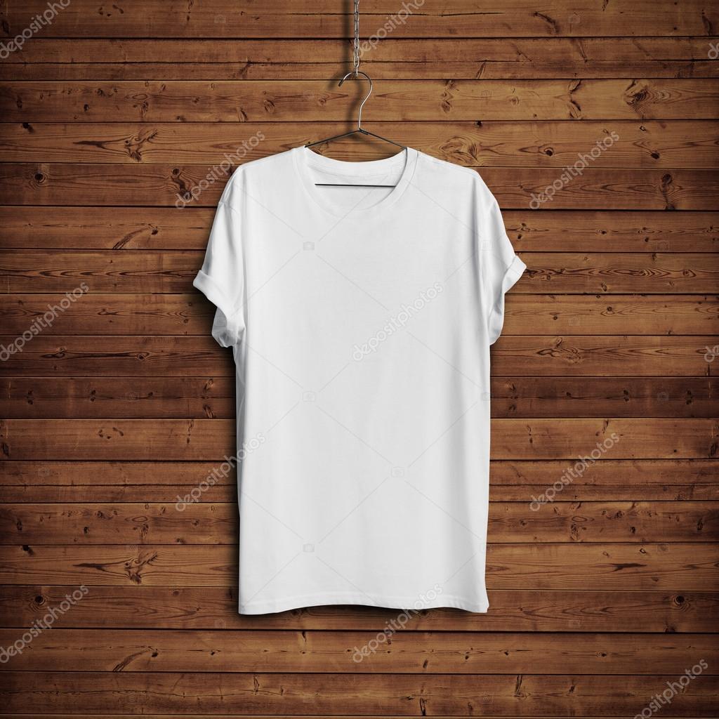 White blank t-shirt on dark wood wall
