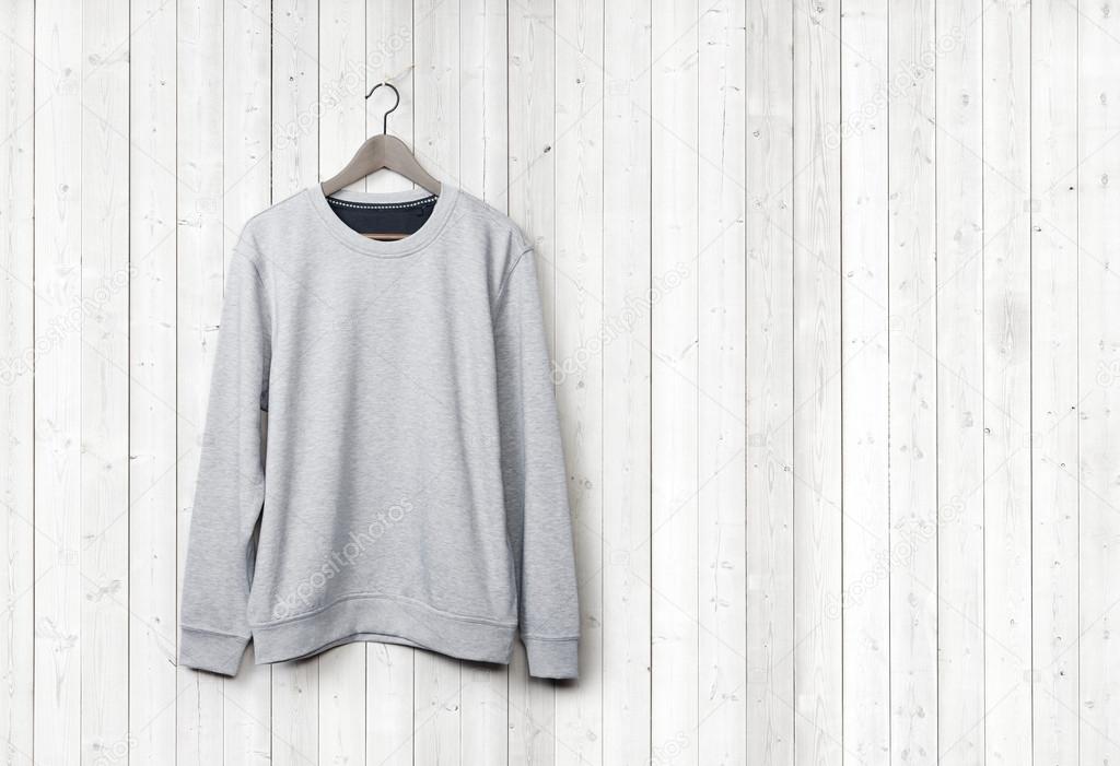 Sweater on white wall