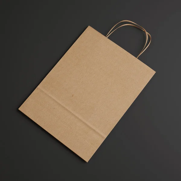 Brown paper bag with handles — Stock Photo, Image