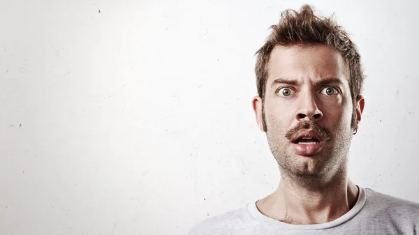 Hombre sorprendido con bigote — Foto de Stock