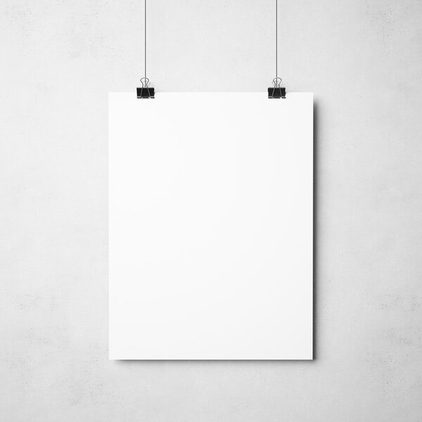 Blank poster hanging on binders on concrete background