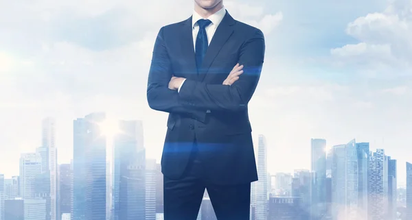 Businessman and blurred city — Stock Photo, Image