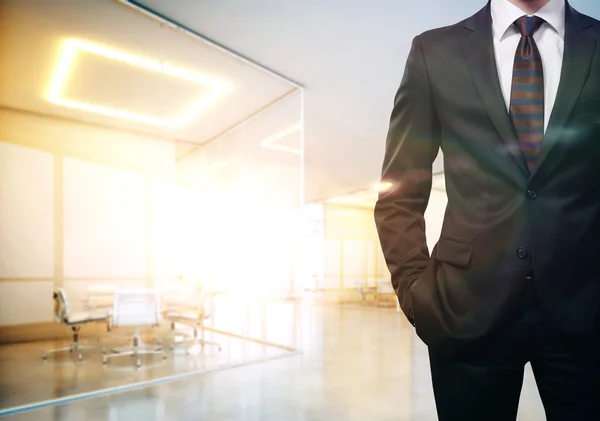 Businessman in sunny office — Stock Photo, Image