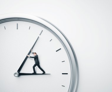 Zamanı durdurmaya çalışırken iş adamı