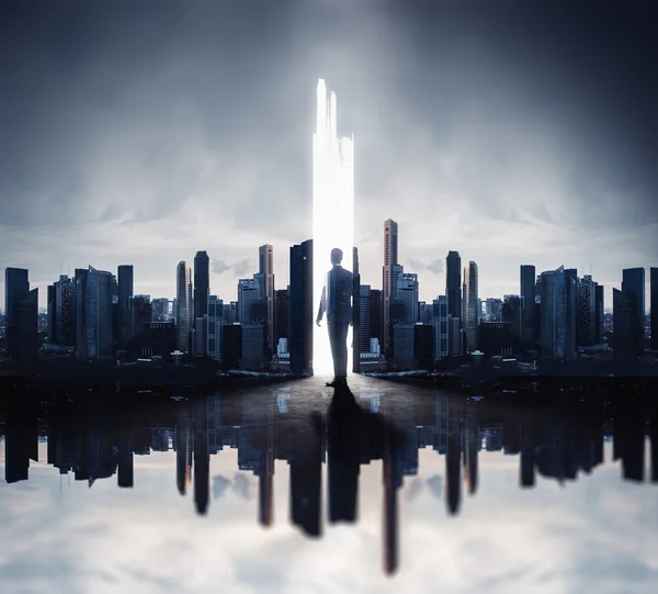 Concept with businessman and skyscrapers — Stock Photo, Image