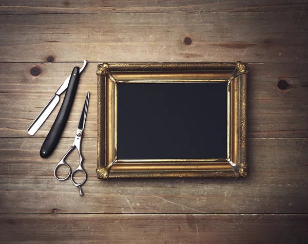 Frame and vintage barber tools — Stock Photo, Image