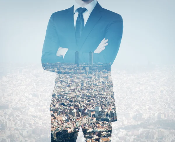 Double exposure of young businessman — Stock Photo, Image