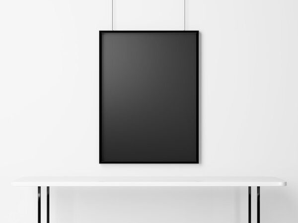 Blank black frame under white table
